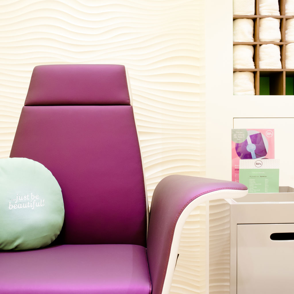 A cozy beauty salon offers a warm and welcoming atmosphere for clients.