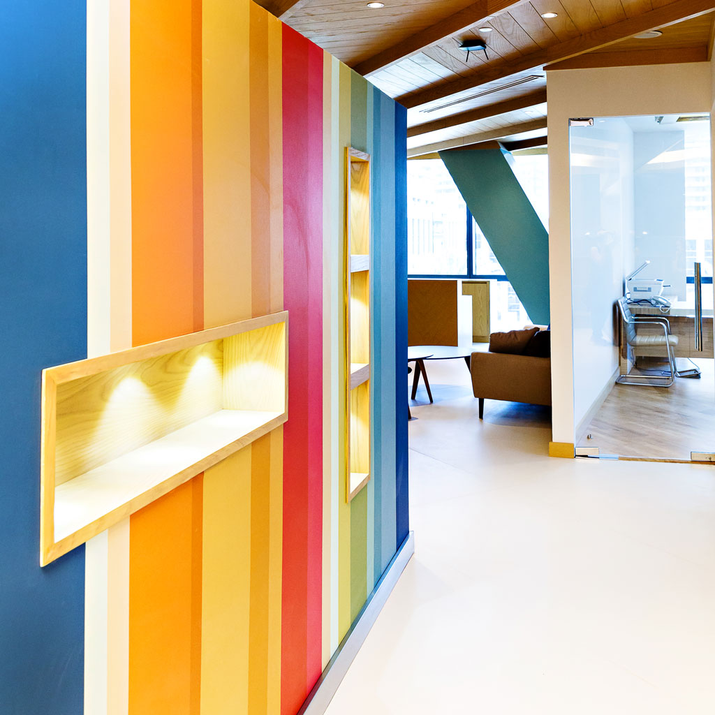 An energetic and vibrant office interior design in a funky style bursts with colors