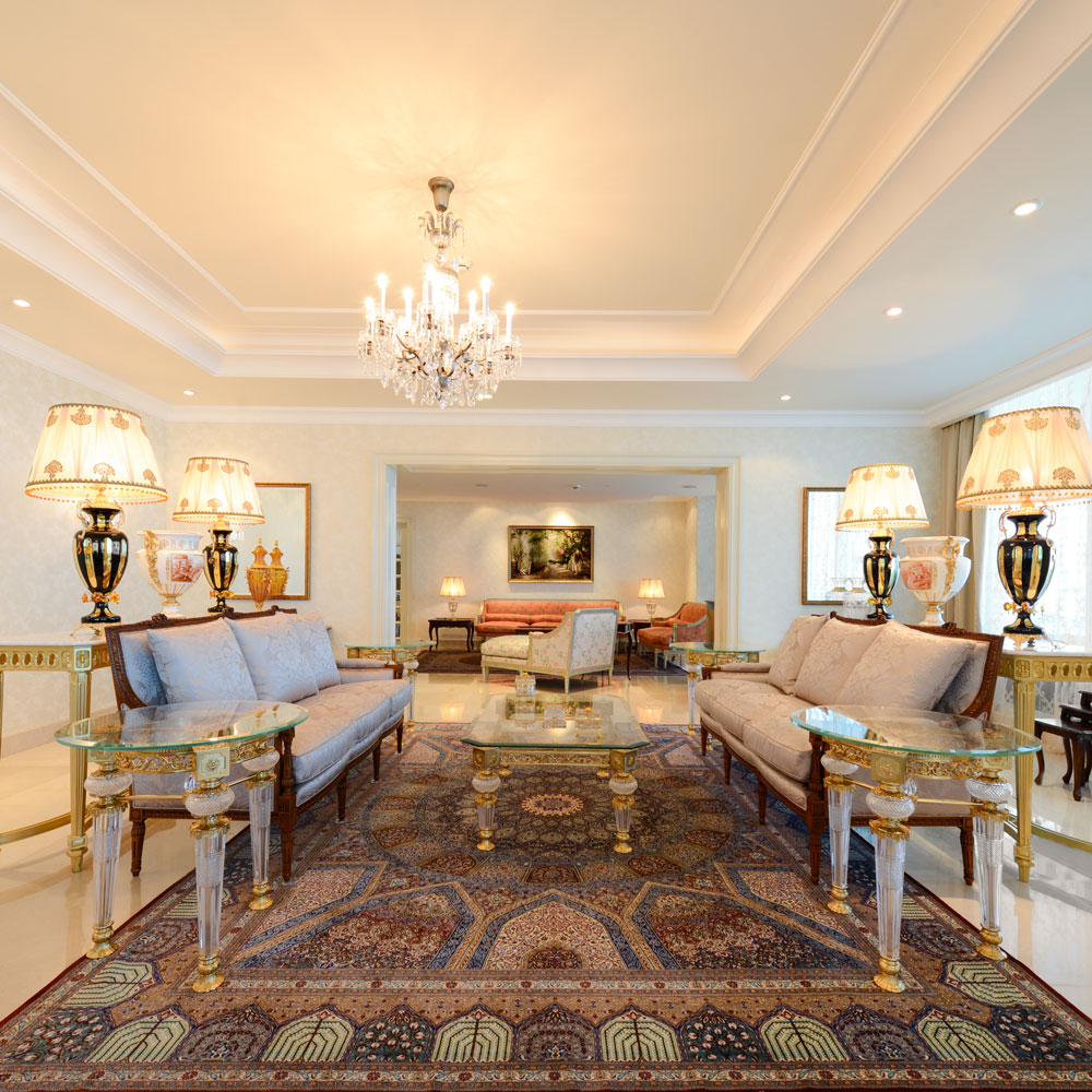 Classical interior design, with ornate chandeliers and handcrafted woodwork evoking centuries-old sophistication