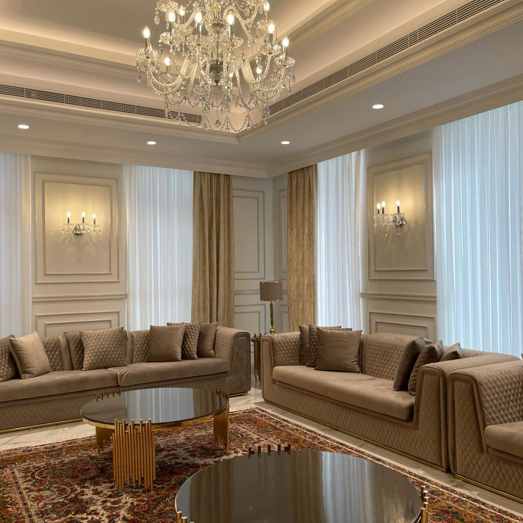 Delicate arches and architectural details evoke a sense of grandeur in the Arabic majlis sitting.