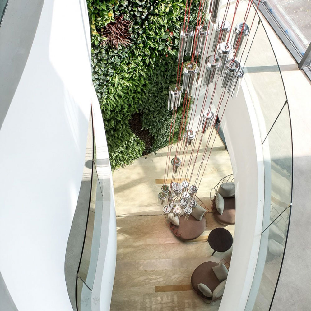 Hotel lobby featured chandelier for the staircase area
