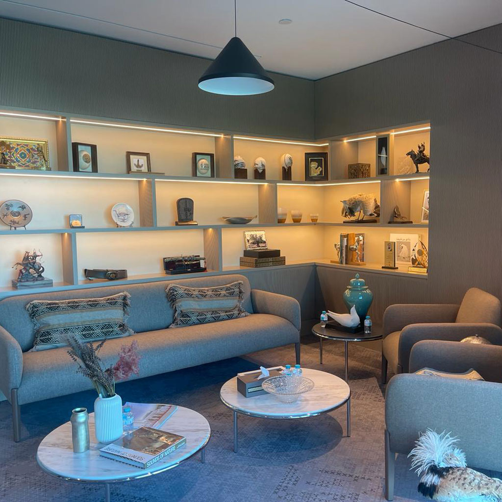 Plush seating provides comfort for both meetings and moments of reflection in the CEO's office.