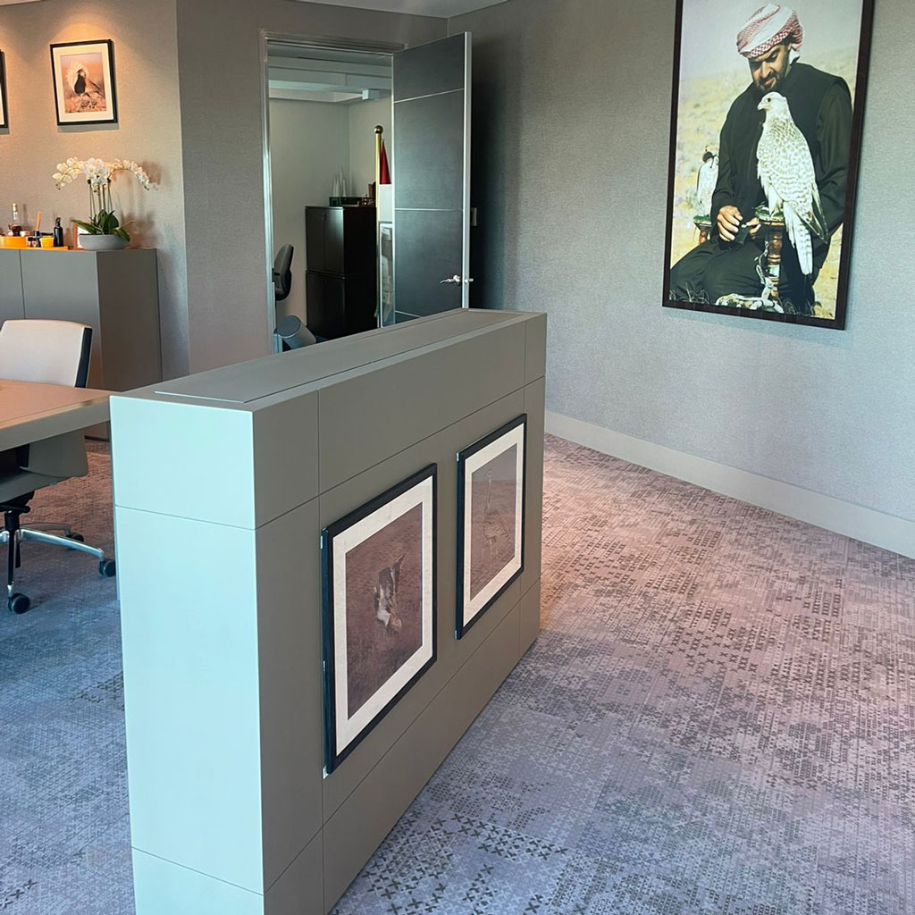 Statement artwork adds personality and sophistication to the CEO's office decor.