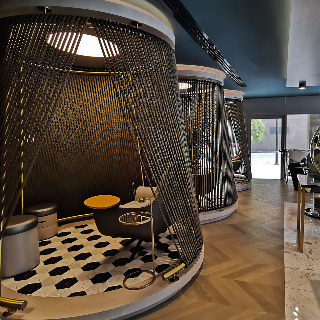 The beauty salon boasts an inviting atmosphere with comfortable seating and vibrant decor.