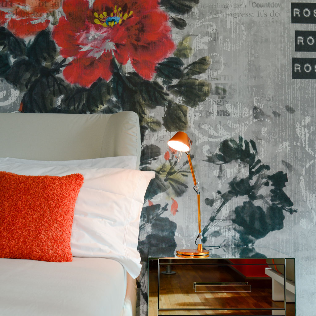 The modern bedroom showcases clean lines and minimalist decor for a sleek ambiance.